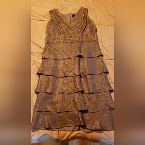 Women's special occasion dress. Beautiful bronze tiered w small jewels.